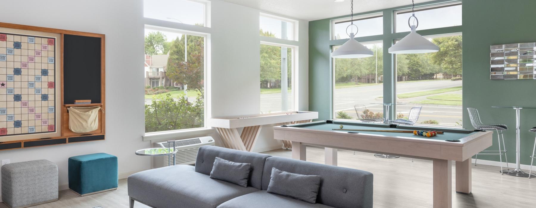 a living room with a couch and a table