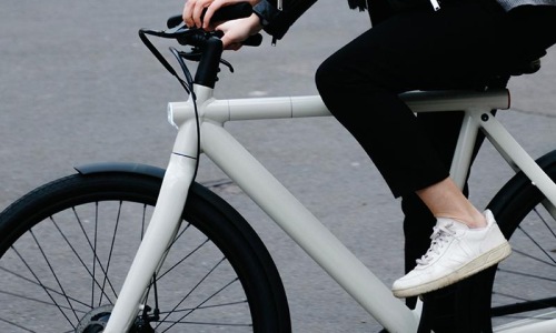 Settle into comfort at 206 Apartments a person riding a bicycle
